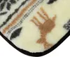A close-up view of a blanket with a pattern. Produktbild-Vorschau