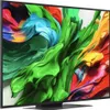 A close-up view of a modern television screen displaying a vibrant, abstract colorful image. Náhľad obrázku produktu