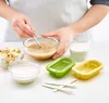 A person is preparing ingredients for making ice pops using Lekue ice pop molds. Produktbild-Vorschau