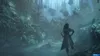 A person stands in a dark, underwater environment with strange floating objects. Produktbild-Vorschau