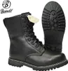 A pair of black leather boots and a separate boot sole are displayed against a white background. The boots have laces and a cream-colored lining peeking out. Anteprima dell’immagine prodotto