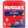 A package of Huggies Overnights diapers featuring a sleeping baby illustration and stars. Produktbild-Vorschau