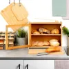 A bamboo bread box filled with various types of bread, placed on a kitchen counter. Náhled obrázku produktu