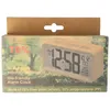 The image shows the packaging of a bio-friendly alarm clock, featuring a digital display of the time and date, along with marketing text and graphics. Náhled obrázku produktu