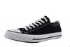 A single black Converse All Star OX Uni Sneaker is shown against a white background. Voir les images du produit