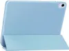 A light blue tablet case is shown standing upright, propped up by its folded cover. Náhľad obrázku produktu