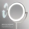 A lighted cosmetic mirror with rotating feature and magnification options. Anteprima dell’immagine prodotto