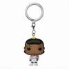 A Funko Pop! keychain of the character Erica from Stranger Things, shown against a white background. Produktbild-Vorschau