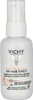 A white bottle of Vichy Capital Soleil UV-Age Daily SPF 50+ sunscreen. Náhled obrázku produktu