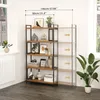 A vintage-style bookshelf with items displayed on its shelves, placed in a room with a window and a plant. Produktbild-Vorschau
