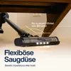 A vacuum cleaner head is shown cleaning under a wooden table. Produktbild-Vorschau
