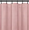 A close-up view of a pink curtain hanging from a black curtain rod. Podgląd zdjęcia produktu