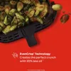 A close-up of an air fryer basket filled with roasted Brussels sprouts, with text describing its features. Produktbild-Vorschau