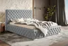 A bedroom scene featuring a tufted upholstered bed. Náhled obrázku produktu