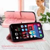 A woman is sitting at a table with a pink phone case and a smartphone displayed on it. Produktbild-Vorschau