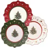 Three Christmas-themed plates are arranged in a cluster against a white background. Anteprima dell’immagine prodotto