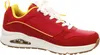 A side view of a red Skechers sneaker with white laces and a yellow accent on the inside lining. Produktbild-Vorschau