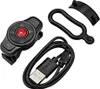 A collection of accessories for a bicycle helmet, including a remote control, a charging cable, and mounting straps. Náhled obrázku produktu