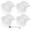 Four white vacuum cleaner filters and a small cleaning brush are arranged on a white background. Produktbild-Vorschau