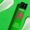 A bottle of Matrix Food For Soft shampoo is shown against a bright green background, with white cream swirls on either side. Anteprima dell’immagine prodotto