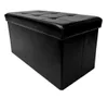 A black storage ottoman is shown against a white background. Podgląd zdjęcia produktu