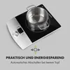 An induction cooktop with a pot on it, showing a feature with an icon and text. Produktbild-Vorschau