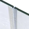 A close-up view of a shower door seal with water droplets on it, attached to a glass shower door. Podgląd zdjęcia produktu