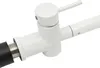 A close-up shot of a white kitchen faucet with a black hose attachment. Produktbild-Vorschau