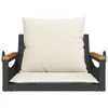 A close-up front view of a black poly rattan hanging chair with cream cushions, set against a white background. Náhled obrázku produktu