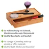 A bamboo storage box with a drawer, containing makeup and a comb. Náhľad obrázku produktu