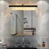 A modern bathroom vanity with a mirrored cabinet and sink. Voir les images du produit