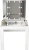 A white vanity table with a tri-fold mirror and LED lights, displaying various cosmetic products. Náhled obrázku produktu