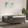 A bedroom scene with a bed, artwork, and a plant. Produktbild-Vorschau