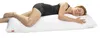 A woman is sleeping on a long white pillow. Anteprima dell’immagine prodotto