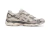 A side view of a single Asics Gel-NYC sneaker in an Oyster Grey colorway, presented against a plain white background. Produktbild-Vorschau