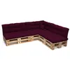 A sectional sofa made of wooden pallets and purple cushions, shown against a white background. Voir les images du produit