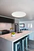 A modern kitchen with a central island, featuring a ceiling light. Produktbild-Vorschau