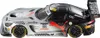 A toy race car with a silver and black design, featuring various sponsor logos and racing numbers. Náhľad obrázku produktu