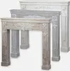 Three fireplace mantels of different colors are displayed side-by-side against a white background. Anteprima dell’immagine prodotto