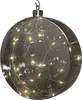 A close-up, studio shot of a decorative glass orb with LED lights inside, suspended by a hook. Anteprima dell’immagine prodotto