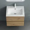 A wall-mounted bathroom vanity with a white sink and a light wood-grain finish. The image is taken from a top-down perspective. Produktbild-Vorschau