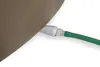 A close-up view of a green garden hose connected to a brown spa or pool via a gray adapter. Produktbild-Vorschau