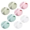 A collection of round, self-adhesive handles in various pastel colors. Produktbild-Vorschau