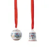Two Christmas ornaments, a ball and a bell, hanging from red ribbons against a white background. Produktbild-Vorschau