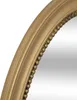 A close-up view of the ornate gold frame of a mirror. Náhľad obrázku produktu