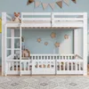 A white bunk bed with a fox stuffed animal on the top bunk, decorated with star-shaped lights and a fabric banner. Voir les images du produit