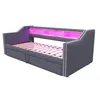 A dark gray upholstered daybed with a slatted wooden base and built-in LED lighting in the headboard, displayed against a white background. Voir les images du produit