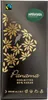 A close-up of a chocolate bar wrapper with decorative floral patterns and text. Náhled obrázku produktu