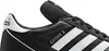 A close-up view of a black Adidas Kaiser 5 Team soccer shoe. Produktbild-Vorschau