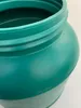 Close-up of the top rim and shoulder of a green plastic barrel. Produktbild-Vorschau